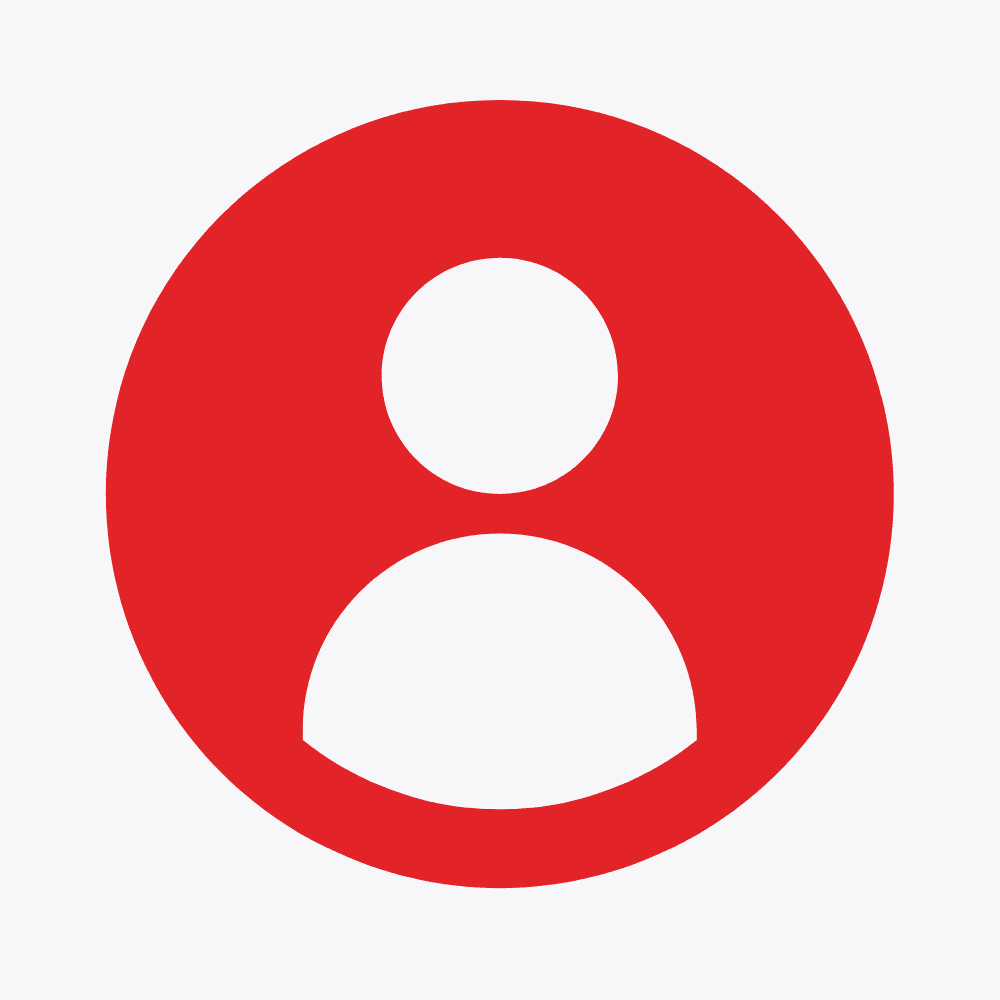Red circular icon with a person silhouette, representing user profiles or human-centered design in Aasted’s solutions